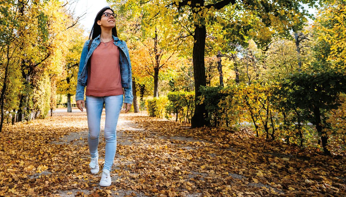 girl-walking-in-leaves-1200x683.jpg